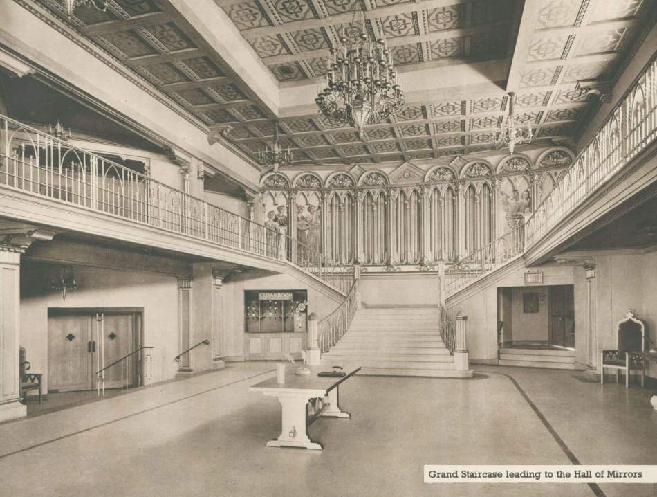 Archive black and white photograph of a staircase within a cinema.
