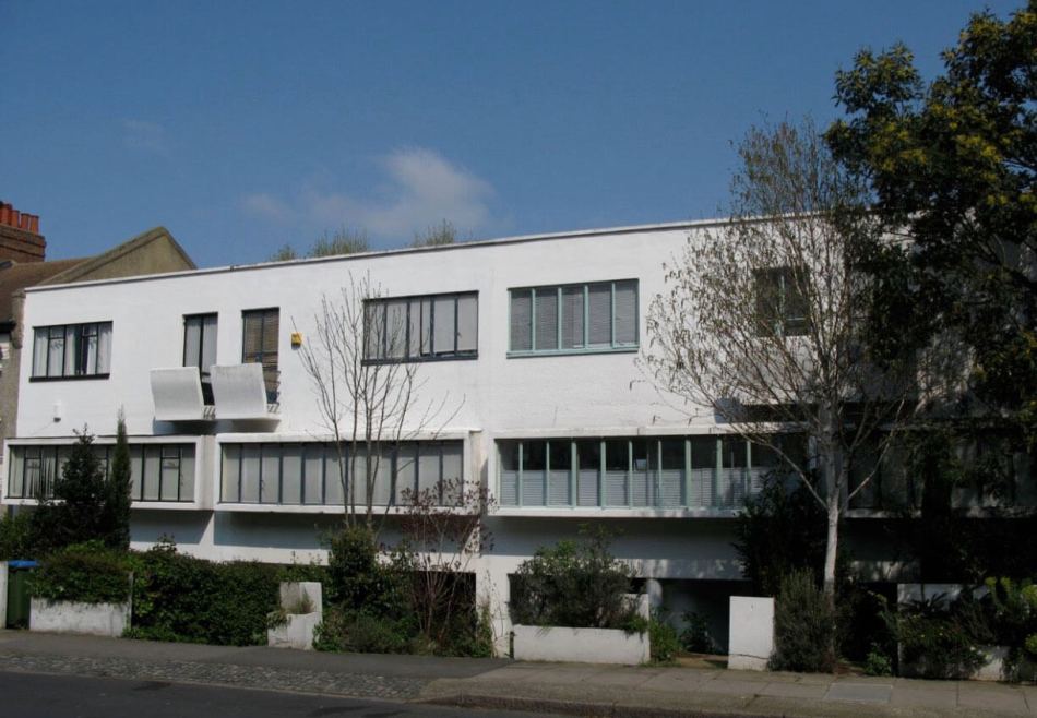 A terrace of 1930s flat roofed houses.