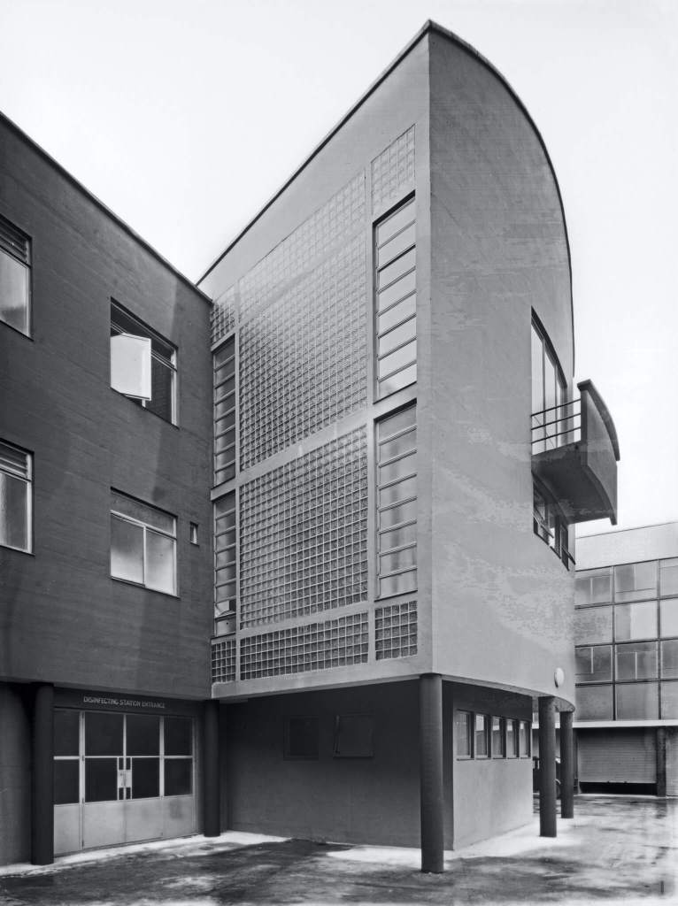 A black and white archive image of a detail of a modernist style health centre.