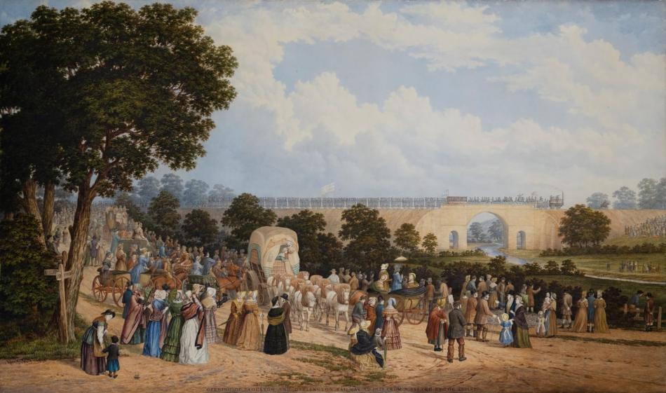 A painting of a railway bridge in the background with a steam train travelling across it. In the foreground, groups of people in early 19th-century dress stand on an unpaved road, looking towards the bridge.