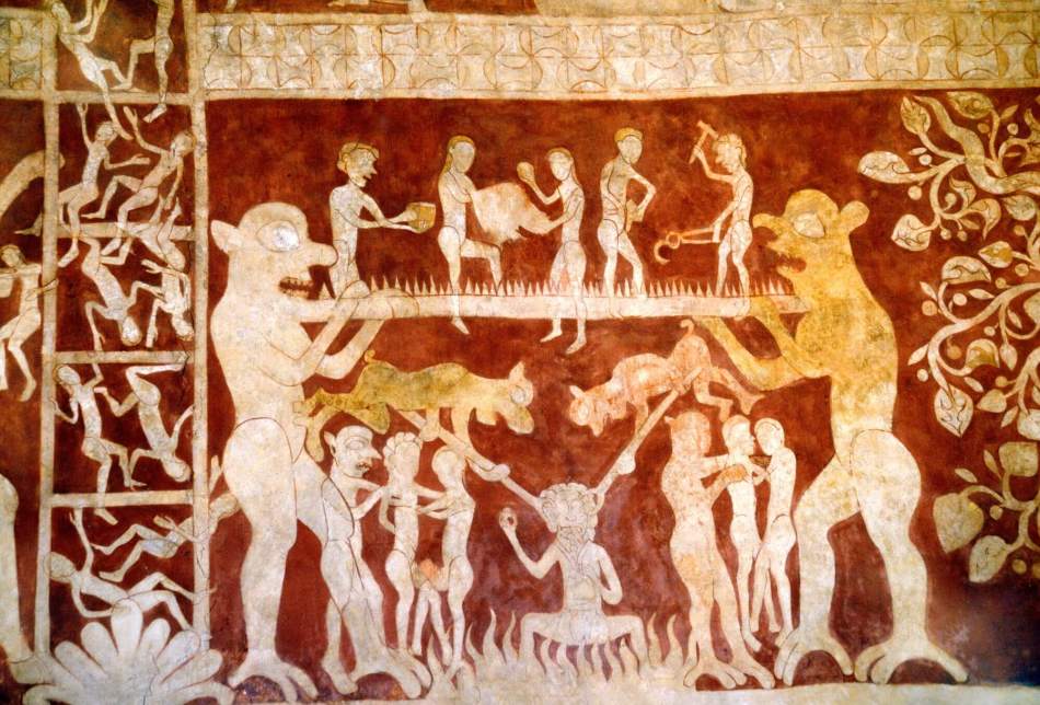A photograph of a detailed wall painting showing a purgatorial ladder with figures falling beside 2 large devilish figures holding a row of spikes with figures standing on them. A bubbling cauldron can be found underneath.