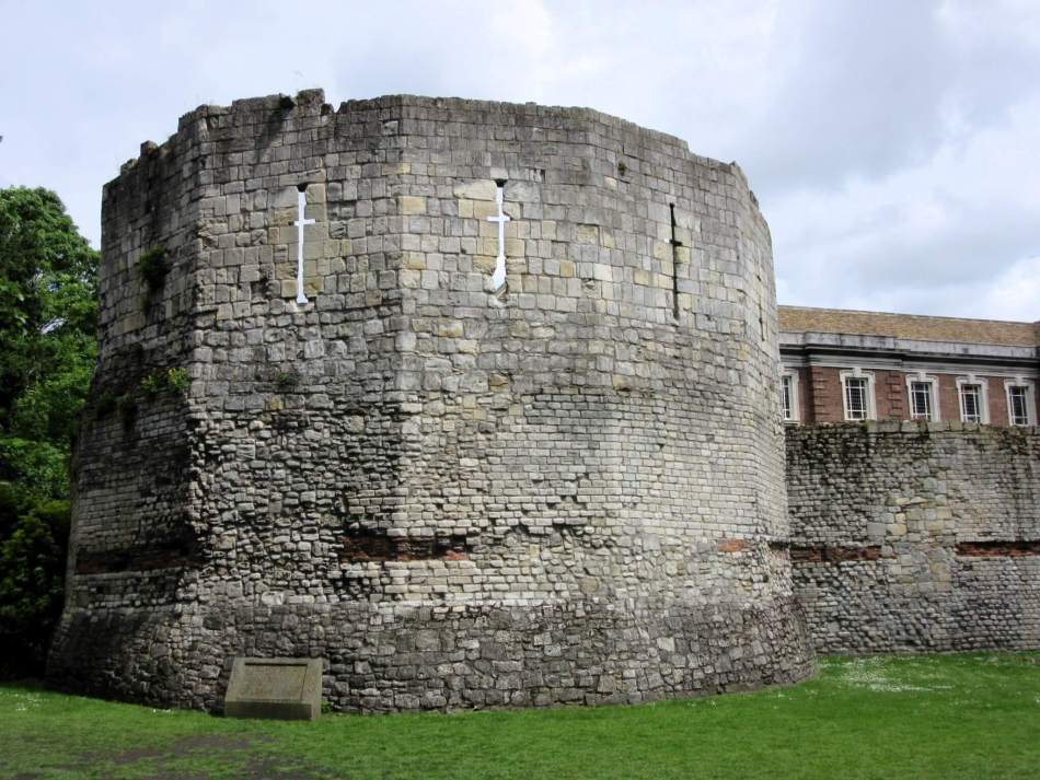 A photograph of the interior of ruins of Roman fortifications and walls. 