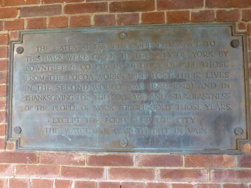 A photograph of a war memorial plaque. 
