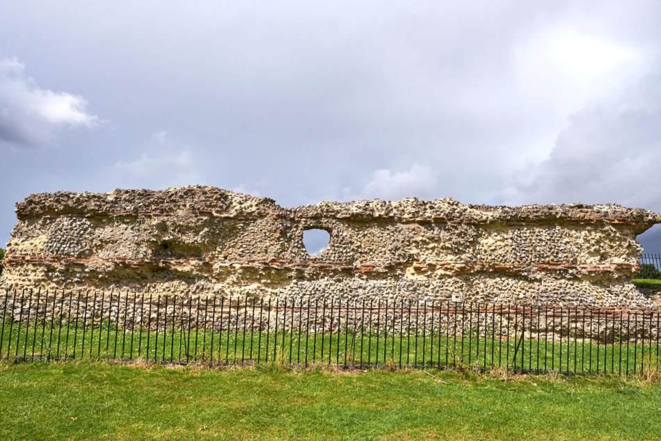A photograph of a section of Roman walling, with characteristic bands of red brick/ tile between the stone.
