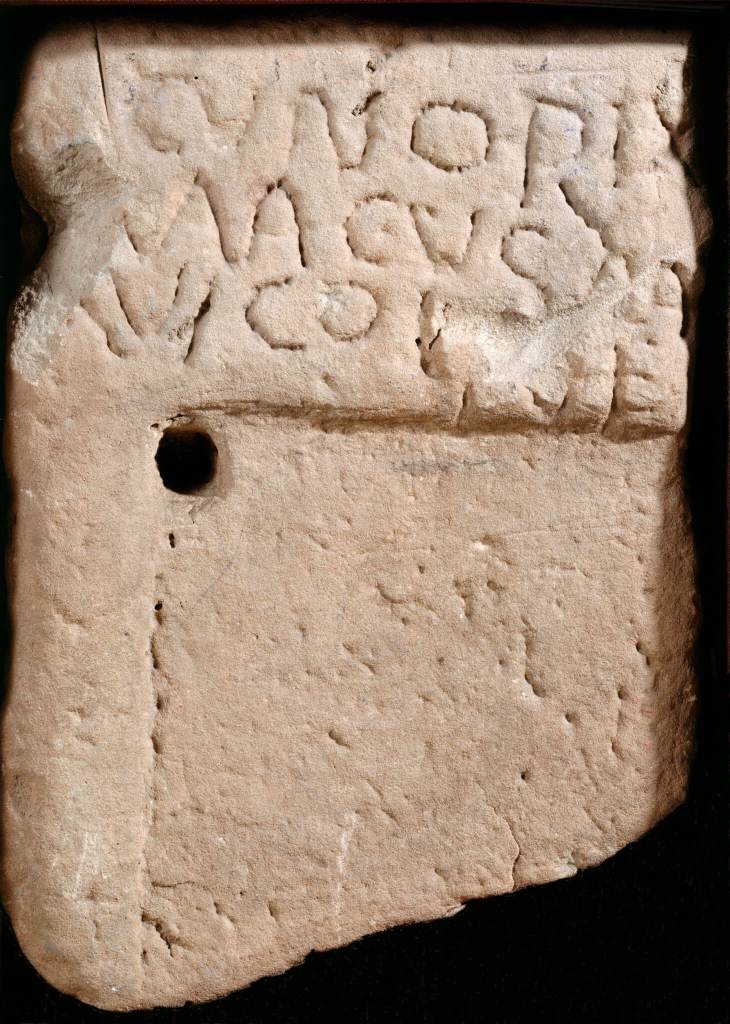 Photograph of an inscribed memorial stone.