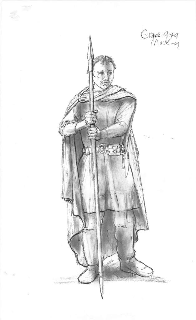 Black and white reconstruction drawing of an Anglo-Saxon man: he carries a spear  and has a belt with metal fittings with a knife attached to it, his cloak is fastened by a broach at the shoulder.