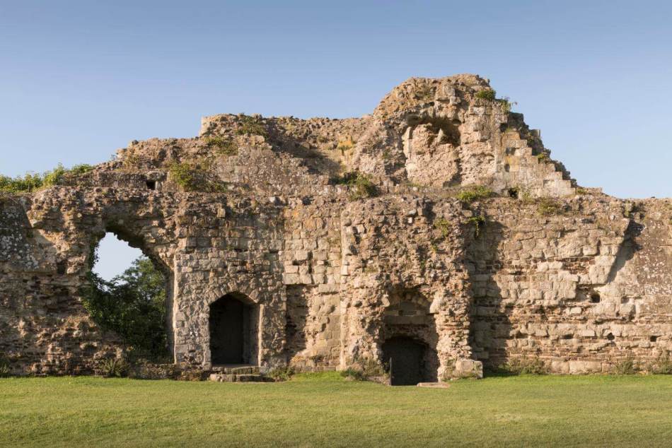 A photograph of a ruined medieval castle, focussing on a ruined tower.